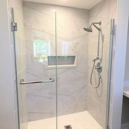 frameless shower door repair lake Orion Michigan,frameless shower door maintenance,frameless shower door seal replacement